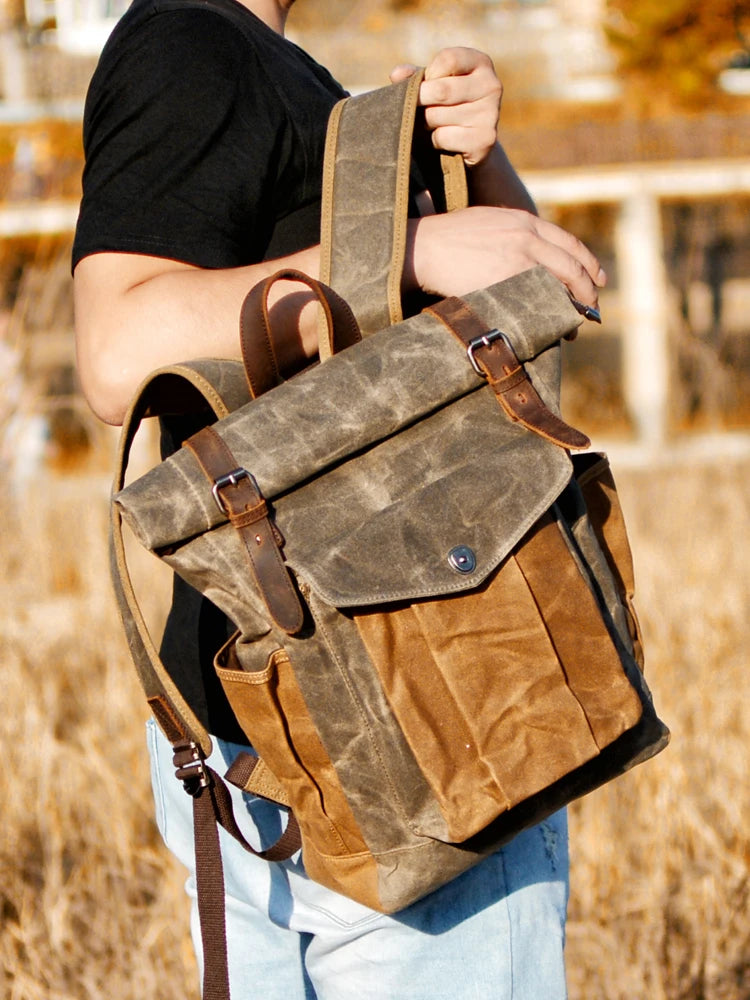 Mochila Vintage de Lona y Cuero – Estilo Clásico, Resistencia y Funcionalidad