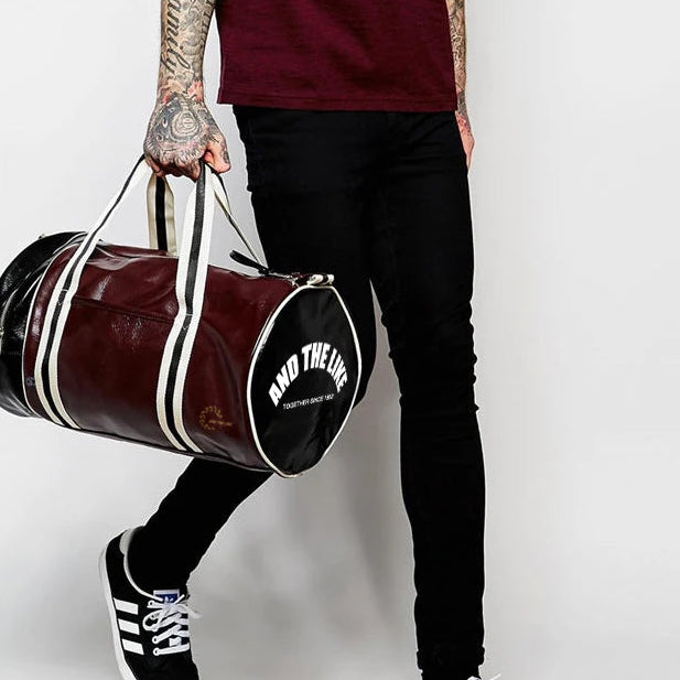 Bolsa de Deporte Cilíndrica en Cuero Color Vino – Unisex
