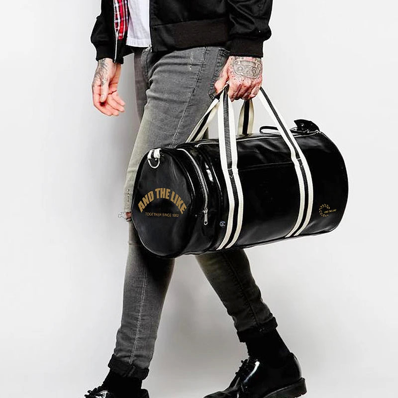 Bolsa de Deporte Cilíndrica en Cuero Negro – Unisex
