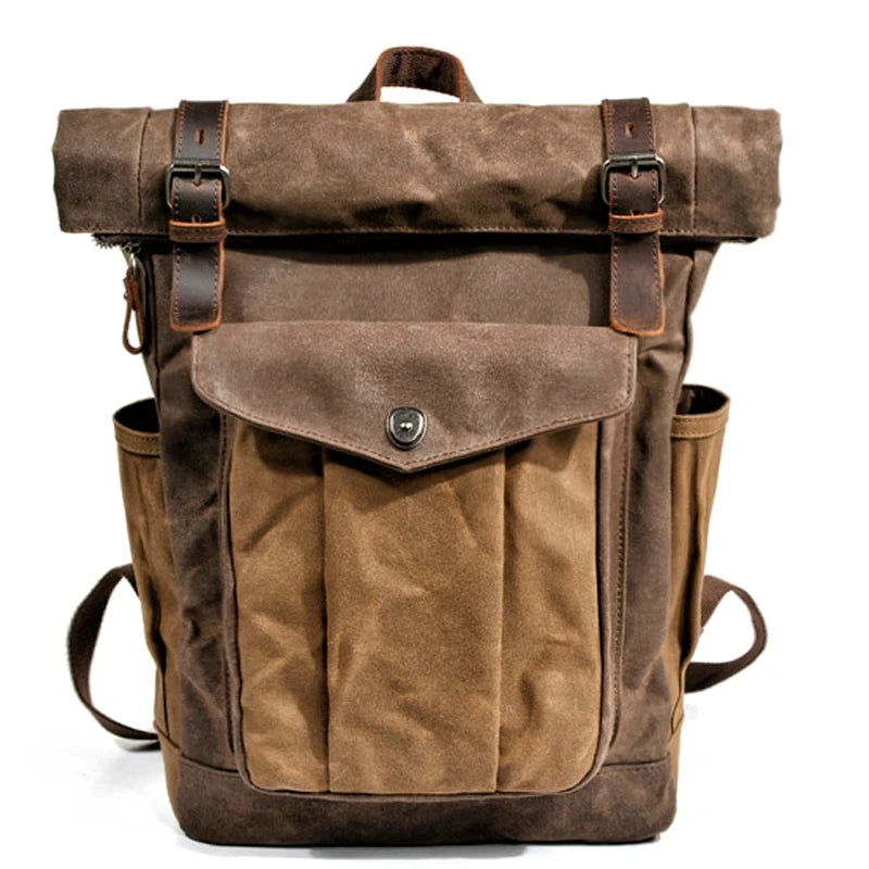 Mochila Vintage de Lona y Cuero – Estilo Clásico, Resistencia y Funcionalidad