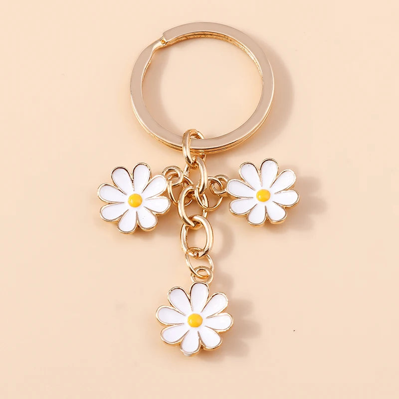 Llavero de Flor de Sakura en Esmalte Lila: Elegancia Japonesa