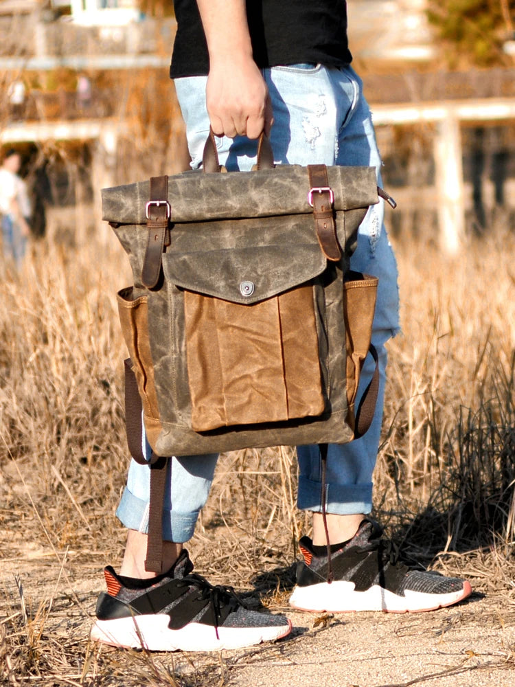 Mochila Vintage de Lona y Cuero – Estilo Clásico, Resistencia y Funcionalidad