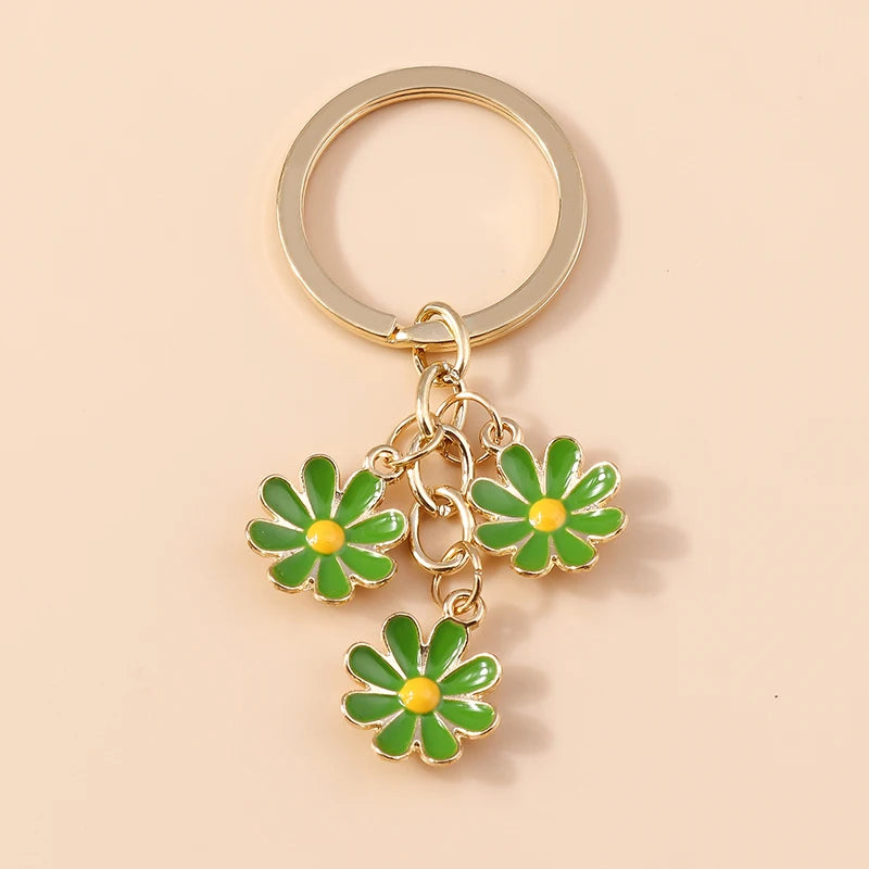 Llavero de Flor de Sakura en Esmalte Lila: Elegancia Japonesa