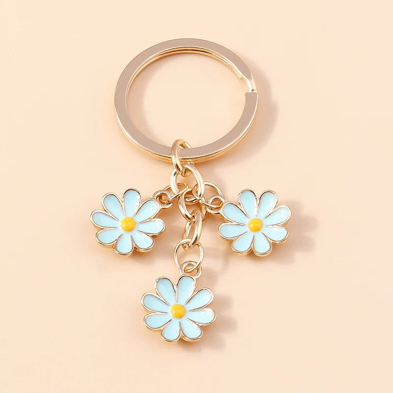 Llavero de Flor de Sakura en Esmalte Lila: Elegancia Japonesa