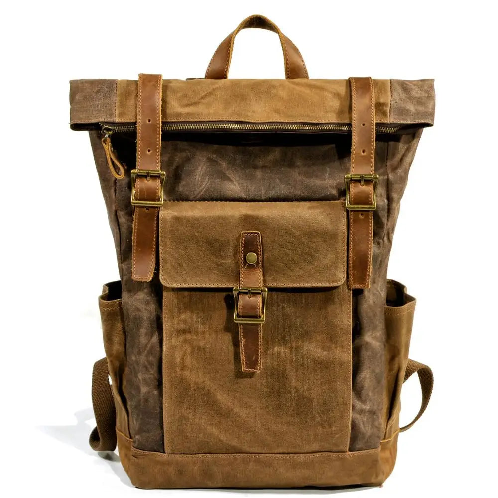 Mochila Vintage de Lona y Cuero – Estilo Clásico, Resistencia y Funcionalidad