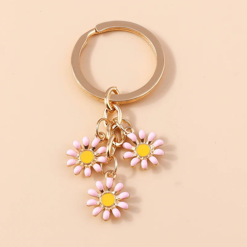 Llavero de Flor de Sakura en Esmalte Lila: Elegancia Japonesa